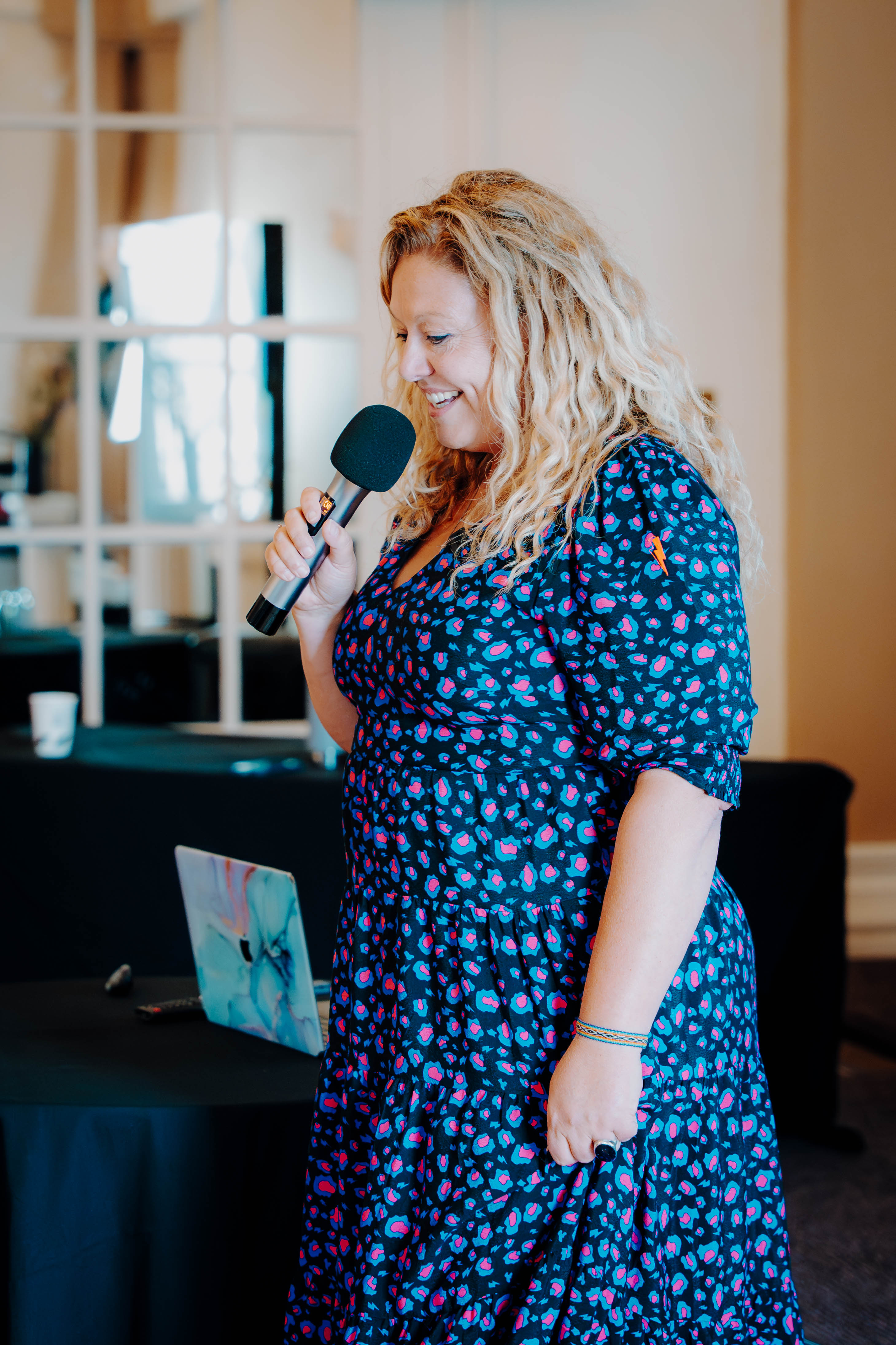 Katie Brockhurst with a microphone